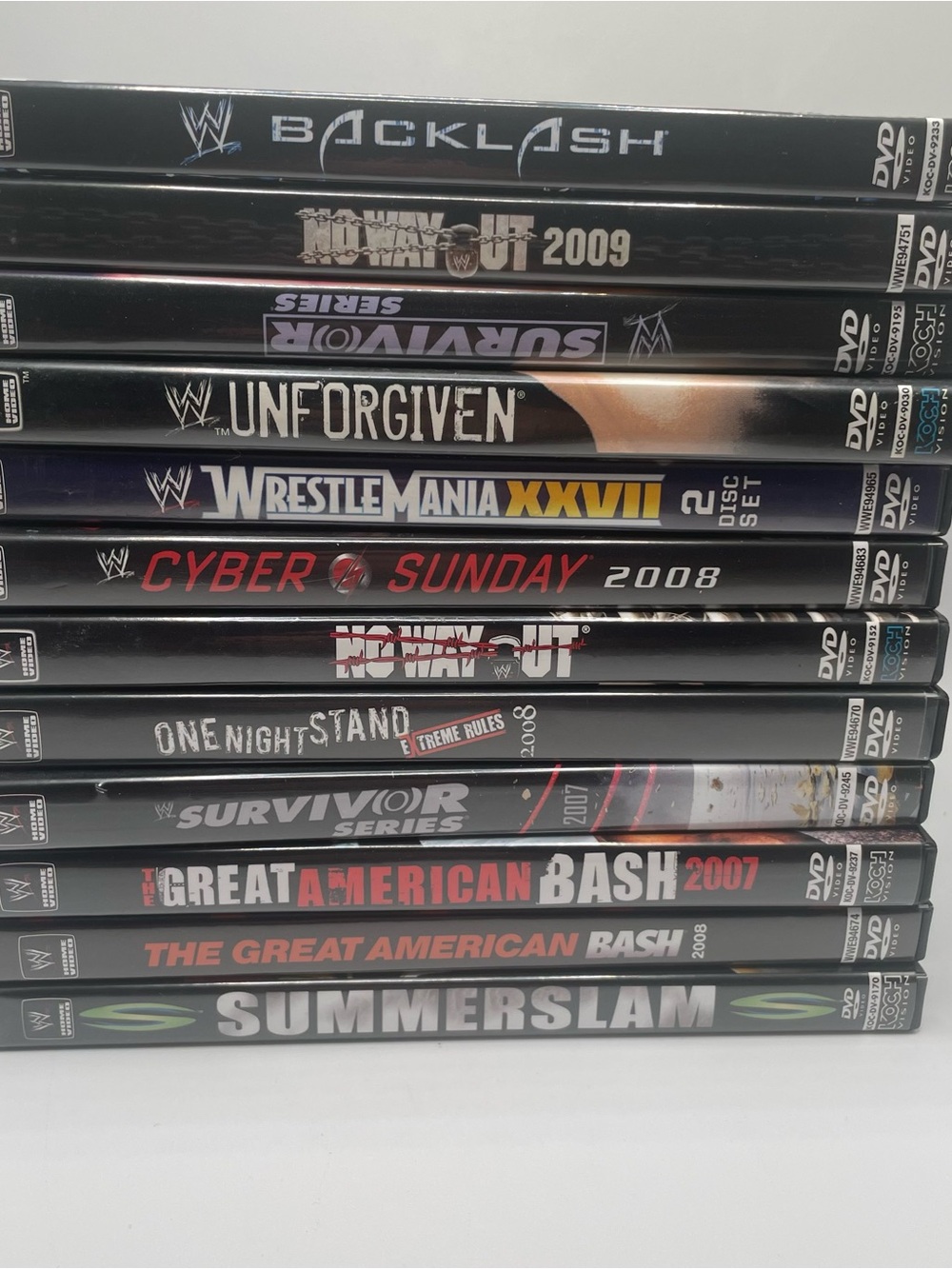 WWE DVD Pay-Per-View Stack – Black With White and Red Accents